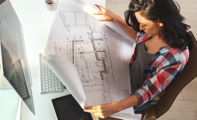 Architect looking over plans