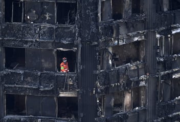 Firefighters in aftermath of Grenfell tower. Credit: EPA