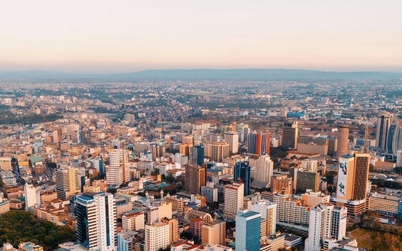 Aerial view of Nairobi, skyline with modern skyscrapers and roads at sunset. Photographed by @youngafrikanna, Pexels