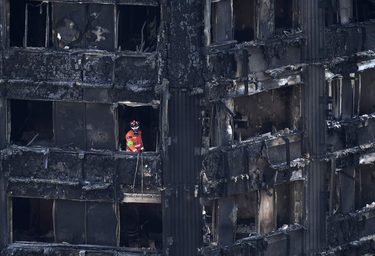 Firefighters in aftermath of Grenfell tower. Credit: EPA