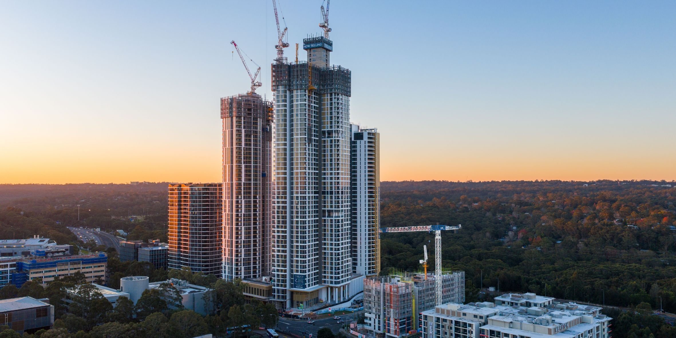 Aerial view of high-rise buildings under construction at sunset in Sydney, Australia - Marcourt Media Pexels