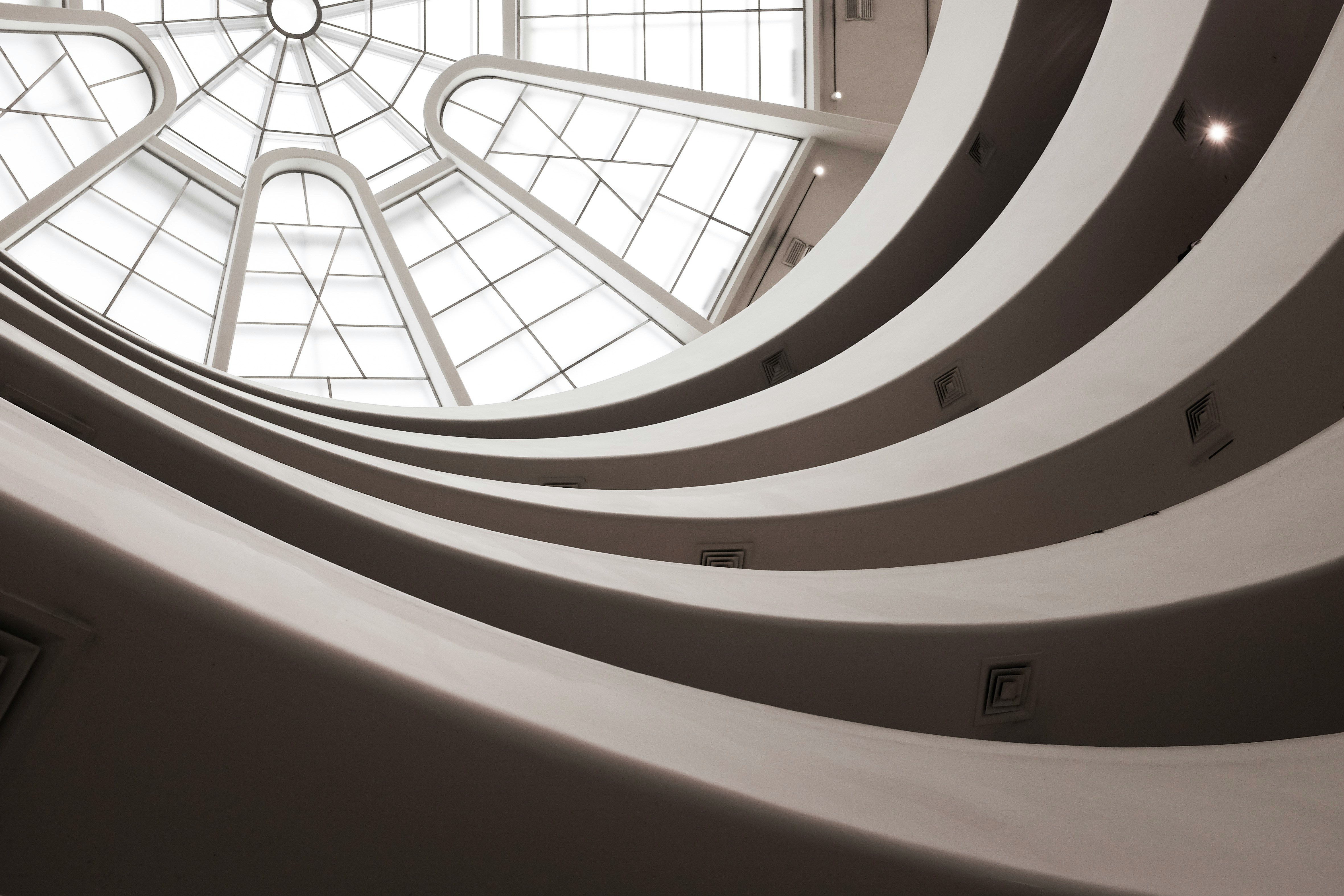 Photo Guggenheim ceiling by @alexeckermann unsplash.com